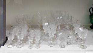 Quantity of cut glass drinking glasses including a set of six wine glasses, a set of six sherry