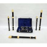 Buffet clarinet in case and a collection of Aulos recorders  the model number is 293881