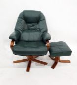 20th century armchair and footstool finished in green leatherette