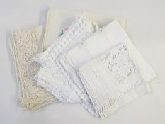 Various table linen including cut and drawn thread, embroidered (1 bag)