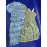 Smocked child's dresses - blue with white, blues and pink  smocking. floral with white collar, pinks