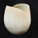 John Ward (b.1938) Stoneware tulip shaped vase with shaped rim and finished in a mottled cream and