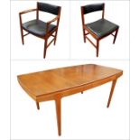 Mid 20th century Vanson teak extending dining table and six Vanson chairs (2+4) with black