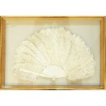 Cream ostrich feather and bone fan, framed