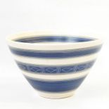 Guillot pottery bowl, banded in white and blue with lozenge decoration and terracotta oval dish with