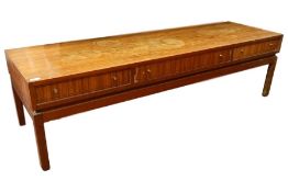 Rectangular coffee table with three double-sided drawers, in teak, on square section supports, 149.