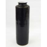 Studio stoneware vase, slight everted rim, shouldered and cylindrical with black glaze, having