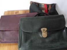 Lonchamp green leather document case with satin brass fittings, a Simpsons of Piccadilly maroon