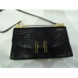 Vintage, 1960's, black crocodile handbag, labelled Selfridges International Collection, brass
