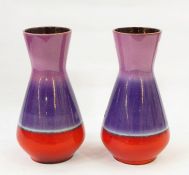 Pair of Carstens West German pottery vases, angular baluster shaped in purple and red (2)