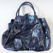Vintage Carlos Faluchi leather handbag printed as snakeskin, in metallic blue with floral lining