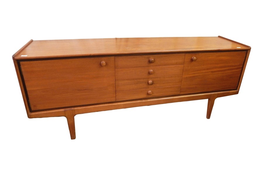 Vanson teak sideboard, having two cupboards flanking four drawers with round handles, the top drawer