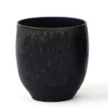20th century studio pottery small bowl, ovoid with black glaze, 7.5cm high (similar to the work of