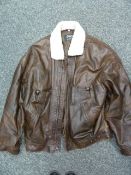 Vintage leather blouson jacket with faux sheepskin collar, vintage fur coat and a fur stole