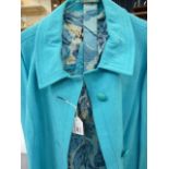 Cresta matching turquoise linen coat and chiffon flower-pattern dress, a raw silk blue shirt dress