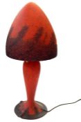 20th century Daum-style glass table lamp in mottled red and blue decoration, having tapering body,