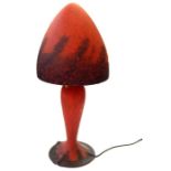 20th century Daum-style glass table lamp in mottled red and blue decoration, having tapering body,