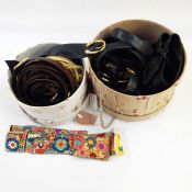 Quantity of 1980's leather belts, brown and black, with brass-coloured Dachshunds and other belts in