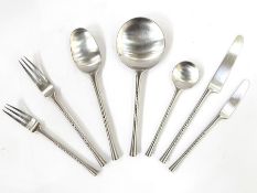 Quantity of Dansk Finland stainless steel table flatware, designed by Jens Quistgaard, with circular