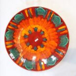 Modern Poole pottery shallow dish 'Volcano' pattern, 39.5cm and modern Poole pottery squat vase, red