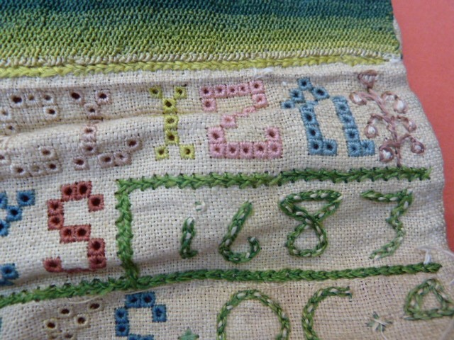 Late 17th century band sampler on natural linen, worked in coloured silks with numerous stiches - Image 8 of 11