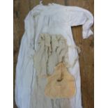 Two Victorian nightdresses, a woollen embroidered baby's cape, a vintage silk blouse and skirt and