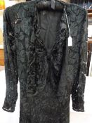 Mid 20th century vintage black evening dress in devore on chiffon, deep bow front with long sleeves