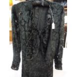 Mid 20th century vintage black evening dress in devore on chiffon, deep bow front with long sleeves