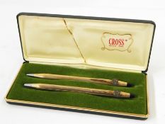 Cross gold plated pen and pencil set with button design, featuring figure clip with rifle man, cased