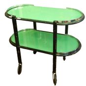 Mid twentieth century drinks/tea trolley, green glass tiers wthin metal frame, on rising wheels,