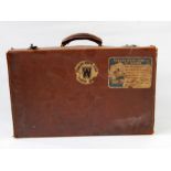 Vintage leather suitcase bearing 'Cunard White Star Cabin Club' label (with loss) and 'Cunard