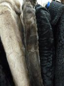 Vintage fur coat, labelled 'The National Fur Company', another vintage fur, a black Persian lamb