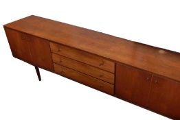 1970's Everest teak sideboard with three central drawers, flanked by cupboards with four doors, on