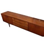 1970's Everest teak sideboard with three central drawers, flanked by cupboards with four doors, on