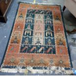 Eastern rug in creams, greens and oranges, 176cm x 119cm