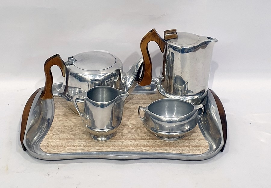 Picquot ware five piece tea service to include teapot, hot water pot, sugar bowl, milk jug and tray