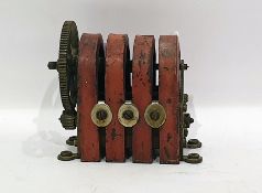 Early 20th century table-top mounted electric engine having cast iron arched top, housing brass-
