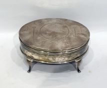 Silver dressing table jewellery box by Joseph Gloster Limited, Birmingham 1922, of oval form, the