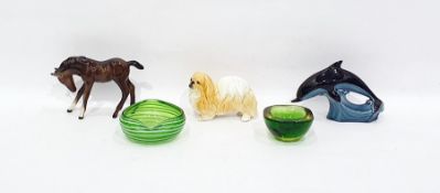 Beswick model of a foal, Sylvac model of a Pekinese, Poole pottery dolphin and two 20th century