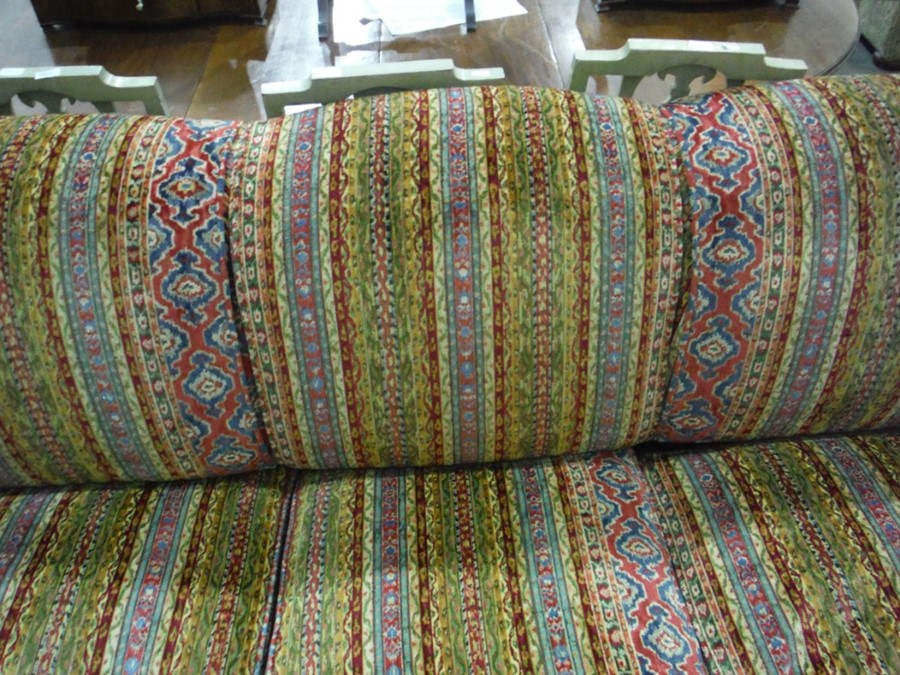 George Smith three-seat sofa in the manner of Howard, vibrantly upholstered, raised upon turned - Image 4 of 6
