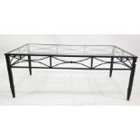 LOT WITHDRAWN Glass-topped and black painted iron-framed rectangular coffee table, 115cm x 43cm