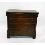 Reproduction mahogany chest with brushing slide, two short drawers, one long drawer, undershelf