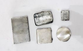 Silver compact by Kigu, London 1967, of engine-turned circular form, a silver notebook holder of