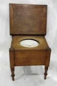 19th century fruitwood commode, the lift-top opening to reveal china lid and bowl