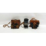 Pair of US Army Signal Corp field glasses in leather case, with inset compass, marked 'Bausch & Lomb