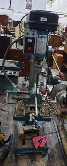 Clark Group bench drill modified to incorporate foot switch , reverse mode and precision vice