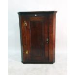 George III oak corner cupboard with two shaped shelves, framed panel door and brass H-hinges, 80cm