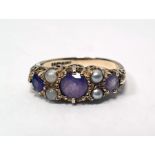 9ct gold, amethyst and seedpearl ring, the three circular mix cut amethysts with seedpearl points,