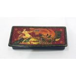 Rectangular Russian lacquer box painted in tempera, decorated with firebird by the Kholui School,