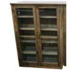 Old pine glazed storage cupboard with pair panelled doors enclosing four shelves, width 92cm